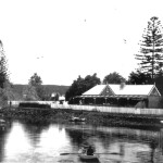 Reyburn House circa 1900; Now with the addition of the east wing. In the foreground is Stanely Reyburn, son of Robert Reyburn Jnr, rowing for home.